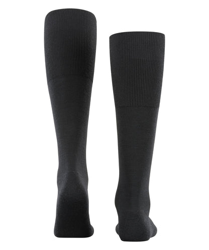 Falke merinoullstrumpa bakifrån med Perfect Fit och förstärkta zoner.