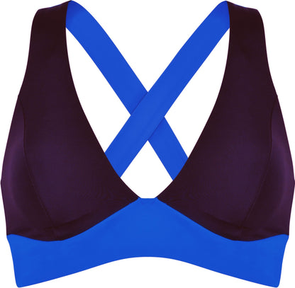 Sportig bikinitopp med vadderade kupor och criss‑cross‑rygg i snabbtorkande material för strand och pool.
